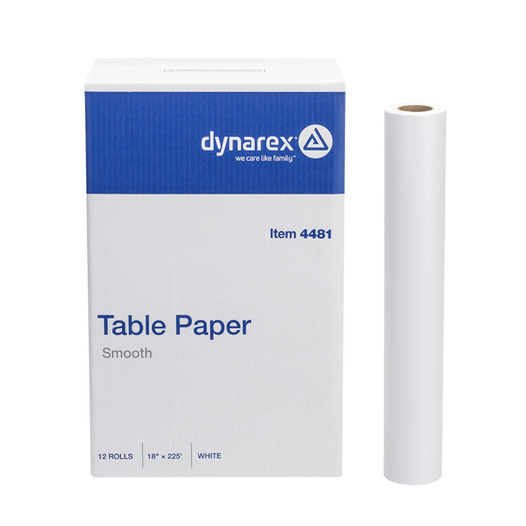 A box labeled Dynarex Exam Table Paper with one upright white roll beside it. The box shows it contains 12 white medical table paper rolls, each measuring 18 inches by 225 feet.