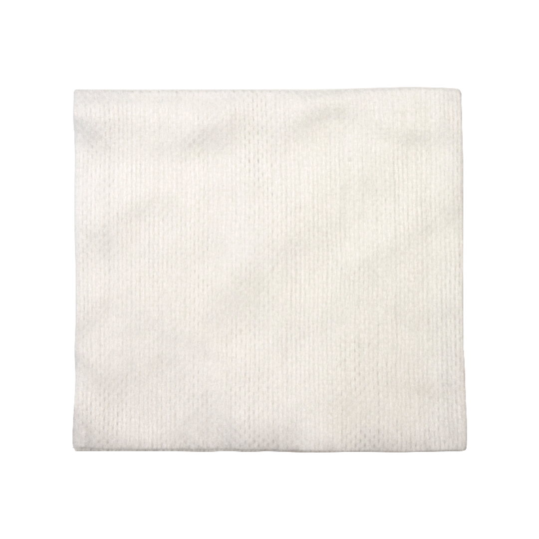 A neatly folded, plain white cloth napkin is shown on a white background, echoing the clean, absorbent qualities of Dynarex CurPro Non-Woven Sponges designed for effective wound care.