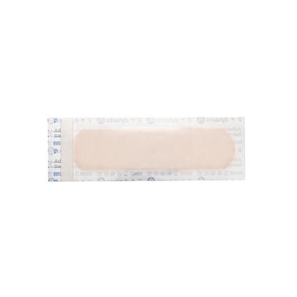 A sterile Dynarex Sheer Plastic Adhesive Bandage in beige, sealed in clear packaging, lies flat on a white background.