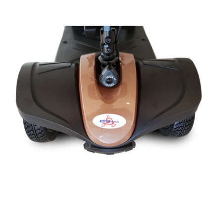 A close-up front view of the EV Rider MiniRider Lite Portable Mobility Scooter with a brown and black body, two large wheels, and a logo with a stylized person in a wheelchair. Refer to the user manual for full specifications.