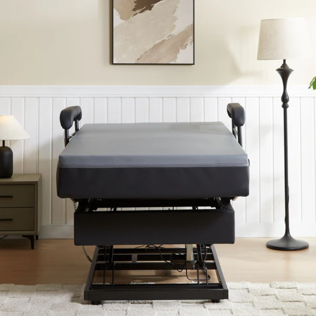 The EZLift Bed Hi-Lo Pro™ Electric Bed with Stand Assist, shown with a gray mattress and black frame in a cozy bedroom, offers comfort and accessibility for those needing stand assist support.