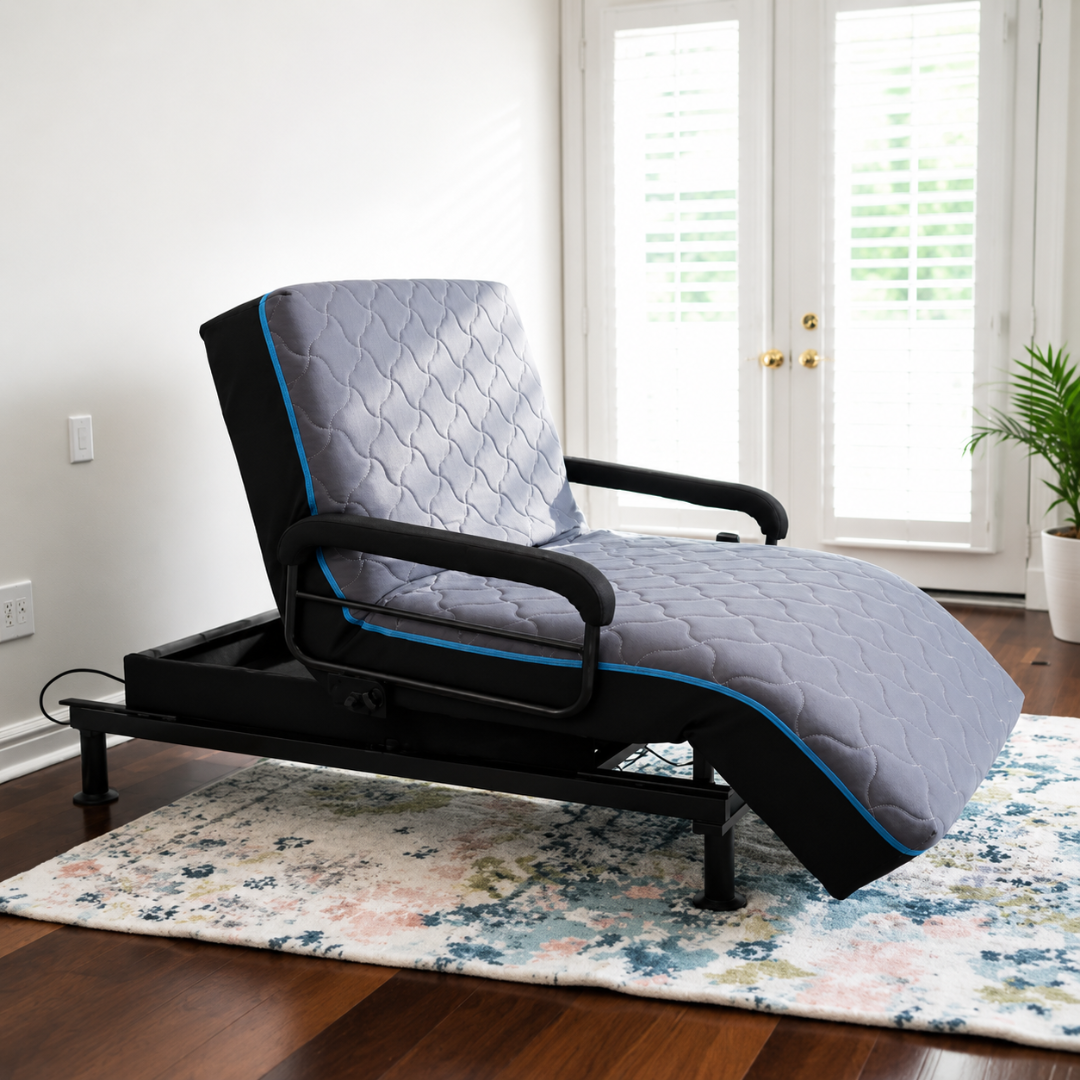 The EZLift Bed™ - Sleep To Stand Bed is featured on a patterned rug in a bright room with wood floors, white walls, French doors with shutters, and a green potted plant—perfect for regaining independence.