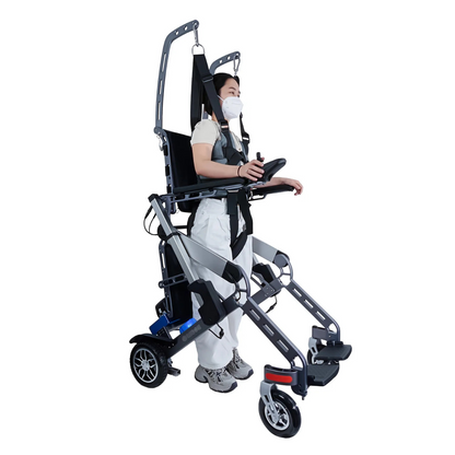 A masked individual uses the Easwe™ S10 Standing Electric Wheelchair for Rehabilitation Training, featuring support harnesses and footrests for upright mobility. The background is plain white.