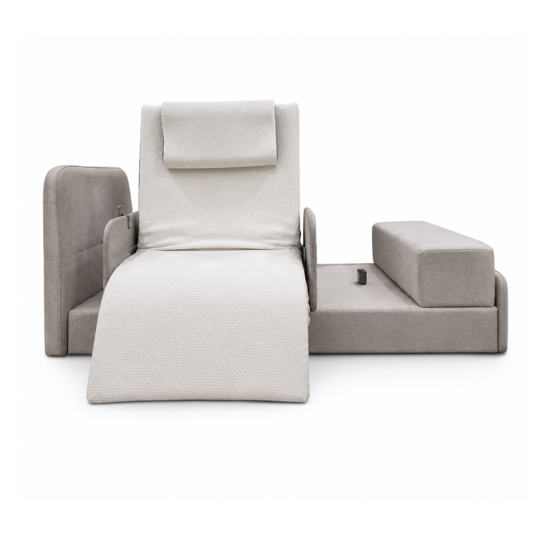 A modern, adjustable reclining lounge chair with a headrest in light gray fabric and a matching ottoman—perfect for pairing with the Elevra Deluxe Rotating Lift Assist Bed for enhanced comfort.