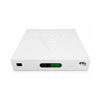 The Vault - Universal Rechargeable Battery Backup by Enouvation is a white device with a raised V2 logo, power button, indicator lights, and connector ports on the front panel, offering reliable backup power for your electronics.