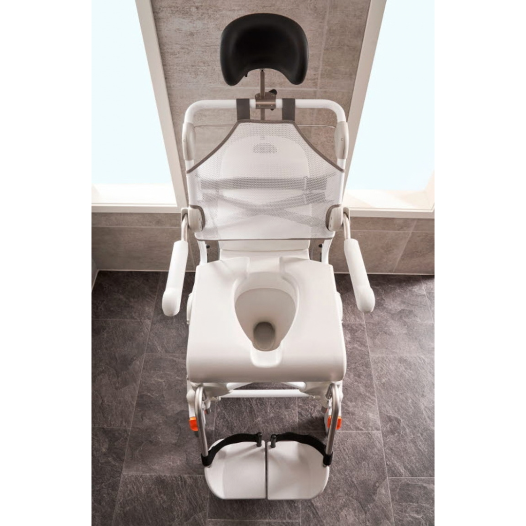 Etac Swift Mobil Tilt-2 tilt-in-space mobile shower commode chair with a white frame, mesh backrest, headrest, armrests, and footrests.