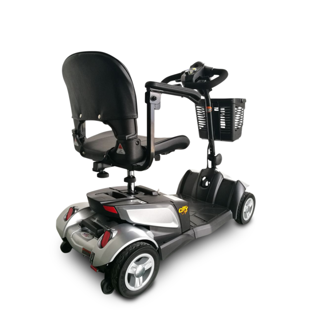A black and silver EV Rider CityCruzer Portable Scooter with padded seat, armrests, steering handle, and front basket is shown from a rear-side angle on a white background.