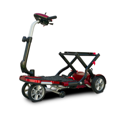 The EV Rider Transport Plus Portable Mobility Scooter in red and black features a foldable design, shown partially collapsed on a white background.
