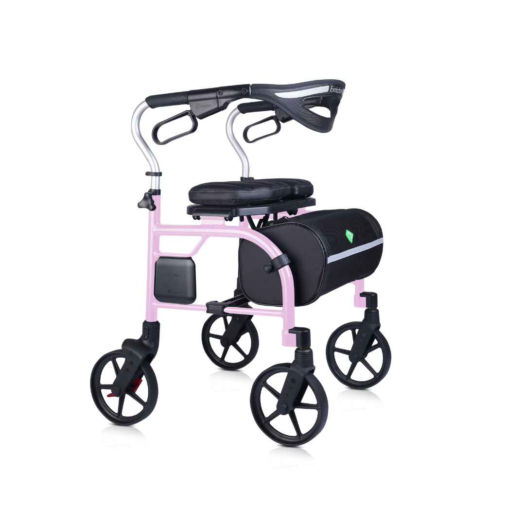 The Evolution Trillium Ultralight Folding Rollator offers stylish mobility in modern pink, featuring four black wheels, a padded seat, curved handlebars, and a black storage bag under the seat—perfect for convenient assistance.