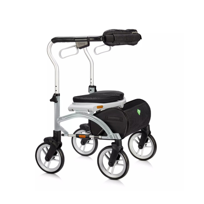 The Evolution Xpresso Lite Carbon Fiber Rollator is an ultra-lightweight, modern walker with four wheels, a padded seat, ergonomic handles, a detachable under-seat storage bag, and a zippered pouch on the handlebar—ideal for daily mobility.
