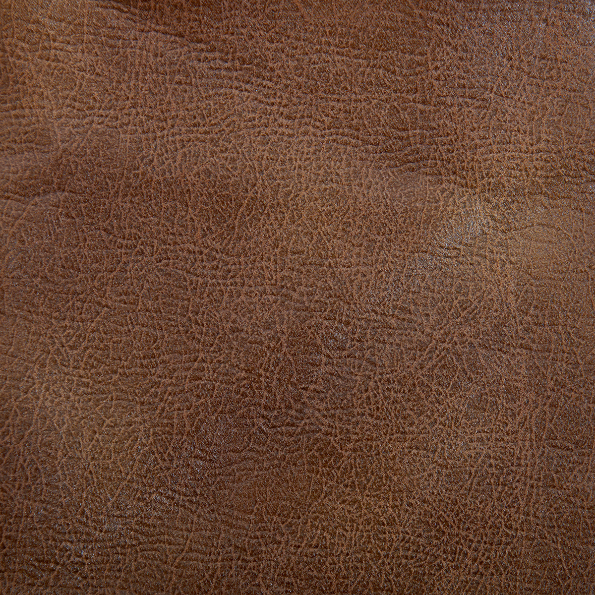 Close-up of the brown textured leather on the Golden Tech PR527 Cloud Recliner With Lift Assist & Twilight - SM/MD, showing fine natural creases, wrinkles, and grain patterns with a slightly worn matte finish and subtle highlights.