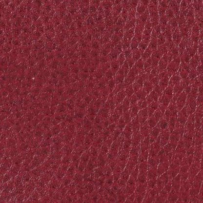 Close-up of the textured, rich burgundy red upholstery with fine grain patterns on the Golden Tech PR527 Cloud Recliner With Lift Assist & Twilight - SM/MD, perfect for a luxurious memory foam recliner.