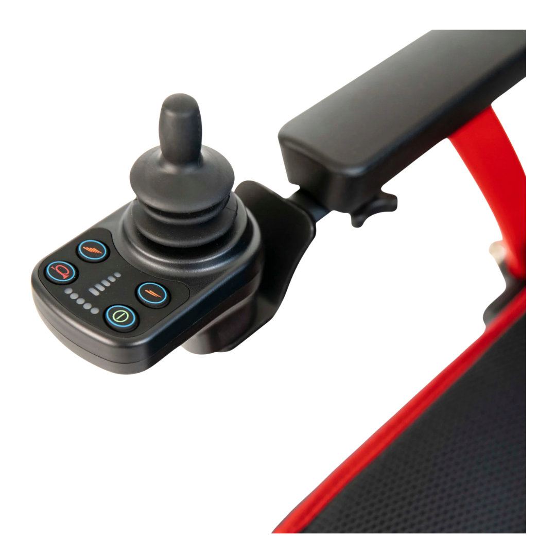 Close-up view of the Feather Powerchair, an ultralight travel-approved electric wheelchair (only 33 lbs), showing its black and red armrest with a joystick controller featuring colorful buttons and indicator lights.