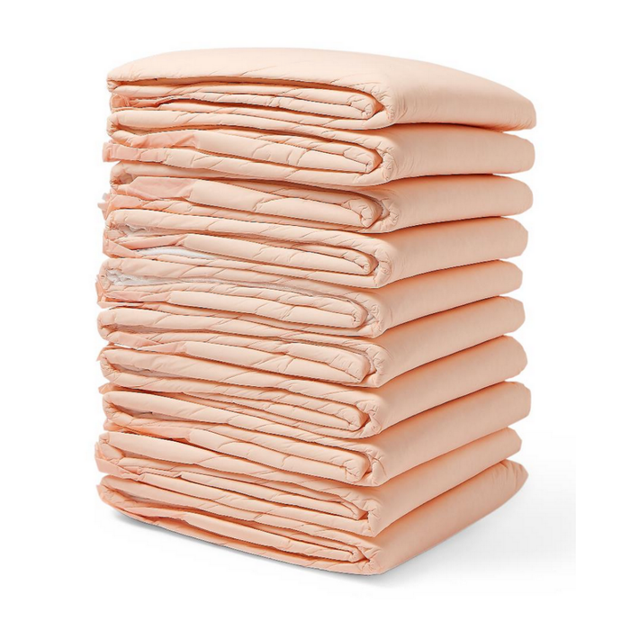 A neatly stacked pile of ten folded, peach Medline FitRight Underpads highlights incontinence products crafted for dependable absorbency and odor control on a crisp white background.