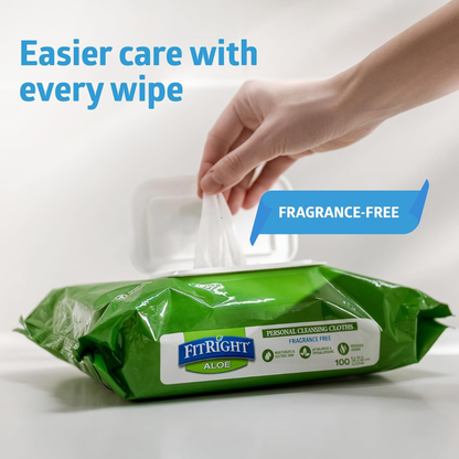A hand pulls a wipe from a green pack of FitRight Aloe Quilted XL Personal Cleansing Wipes. The label notes these sensitive skin wipes are fragrance-free. Blue text says, “Easier care with every wipe.”.