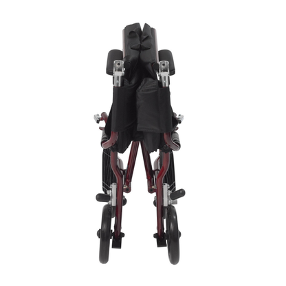 The Drive Fly-Lite Aluminum Transport Chair, shown folded with a maroon frame and black seat, displays its ultra-lightweight and compact design for easy transport or storage.