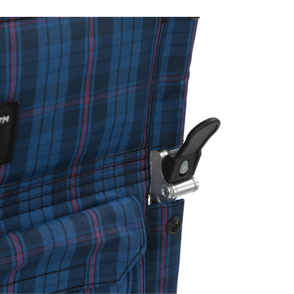 Close-up of blue plaid fabric on the Drive Fly-Lite Aluminum Transport Chair, highlighting a black metal latch attached to the side.