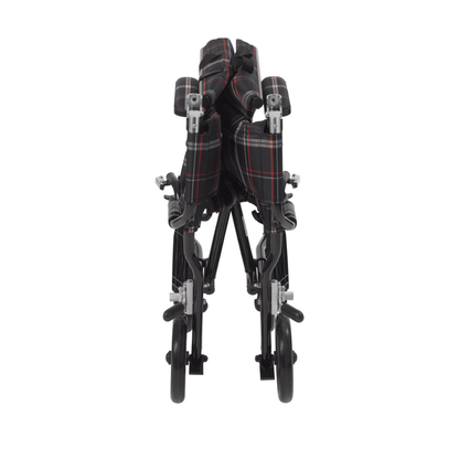 The Drive Fly-Lite Aluminum Transport Chair, seen from the front, features a folded black frame with a red and white plaid seat and backrest, highlighting its ultra-lightweight, compact, and portable design.