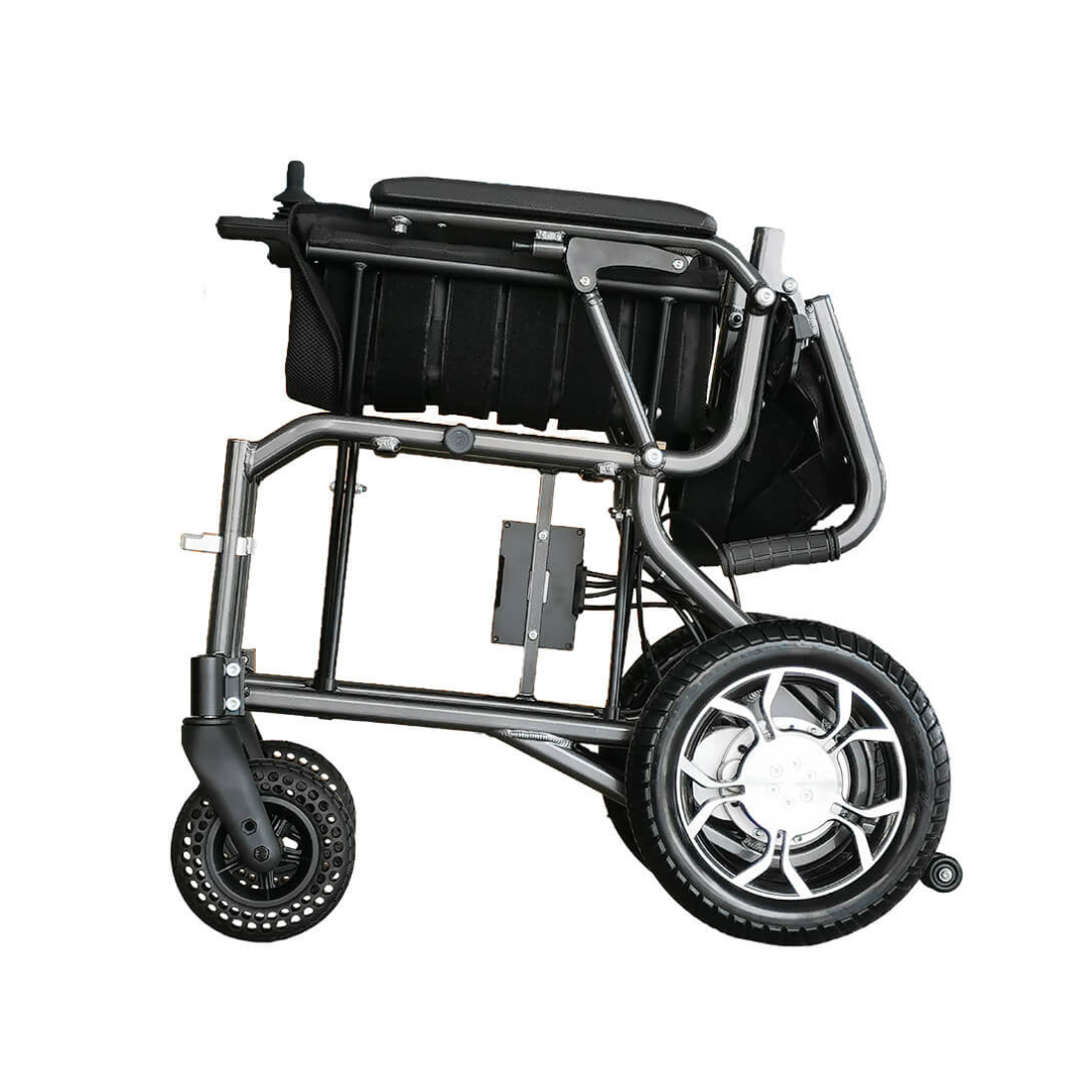 The Foldawheel ECO Lightweight Folding Powerchair is shown folded, featuring large rear wheels, smaller front wheels, and a compact frame for easy transport and storage.
