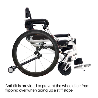 Side view of the Foldawheel Lloyd LEO Ultralite Standing Manual Wheelchair, featuring a small rear anti-tilt wheel to help prevent tipping on steep slopes. Text below describes how the anti-tilt feature works.