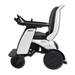 A side view of the Forcemech ARK All-Terrain Heavy Duty Folding Powerchair reveals its modern design with white and black accents. The powerchair boasts ergonomic seating, handlebars, a control panel, and an LED headlight within a sleek, compact form ideal for personal transportation.