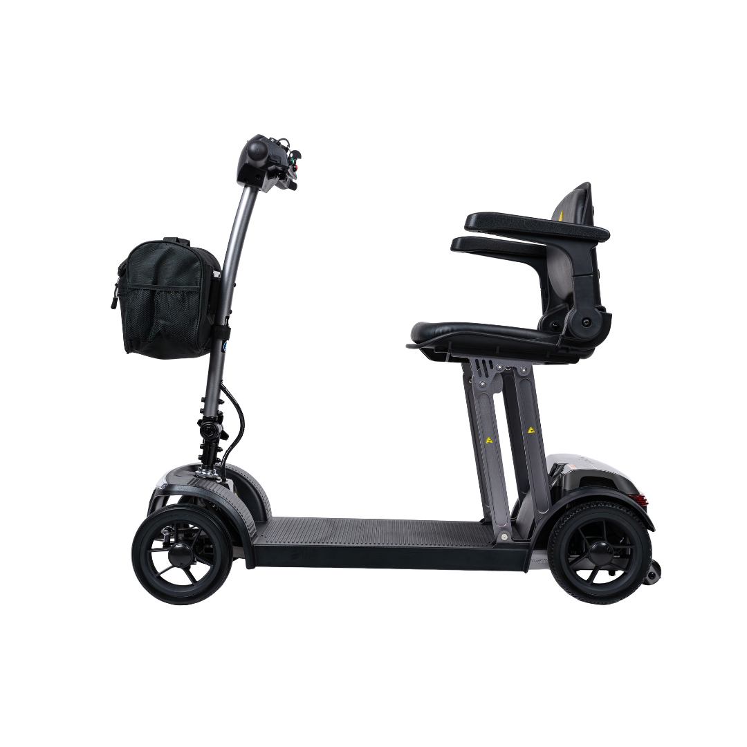 A side view of the Forcemech PathMate Portable Mobility Scooter in black, featuring three wheels, a cushioned seat with armrests, a compact control panel, and a storage bag on the handlebar for easy mobility.
