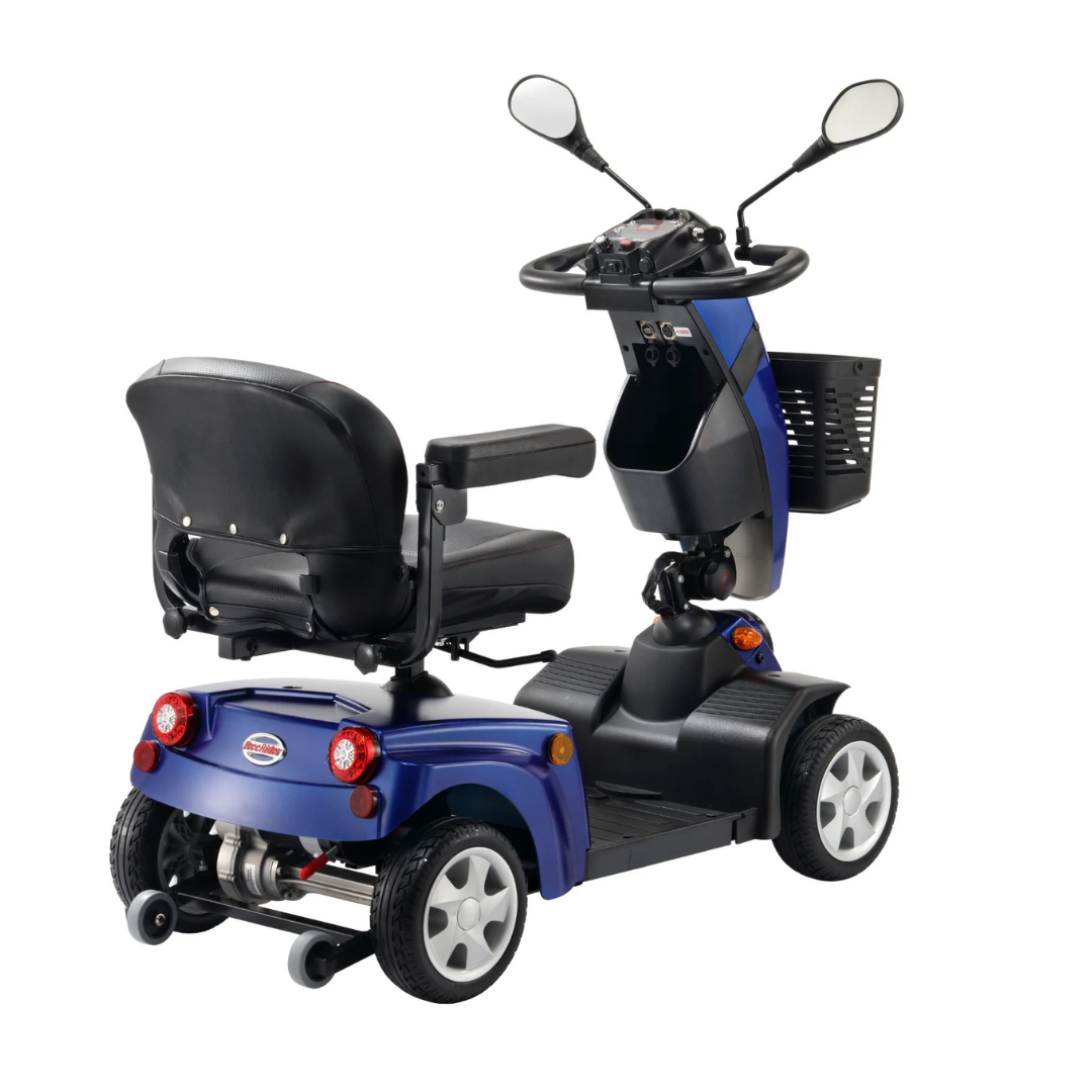The FreeRider FR1 City Heavy Duty Mobility Scooter, in blue, features 4 wheels, rearview mirrors, a cushioned seat with armrests, front basket, and control panel on the handlebars—shown from behind at an angle.