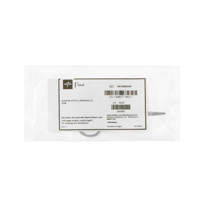 A pair of Medline Fürst Spencer Suture Scissors, visibly sealed in a clear sterile package with a white label displaying product details, barcodes, and text.