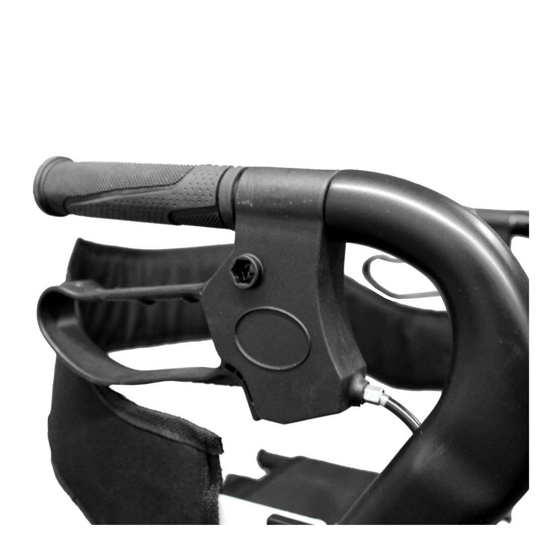 Close-up of the black ergonomic handle with textured grip and brake lever on the GIO Nimbus Lightweight HD Folding All-Terrain Rollator, featuring adjustable height handles, set against a white background.