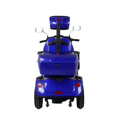Rear view of the GIO Tron Pro blue mobility scooter with 4-wheel stability, storage compartment, dual side mirrors, and large rear wheels, isolated on a white background.
