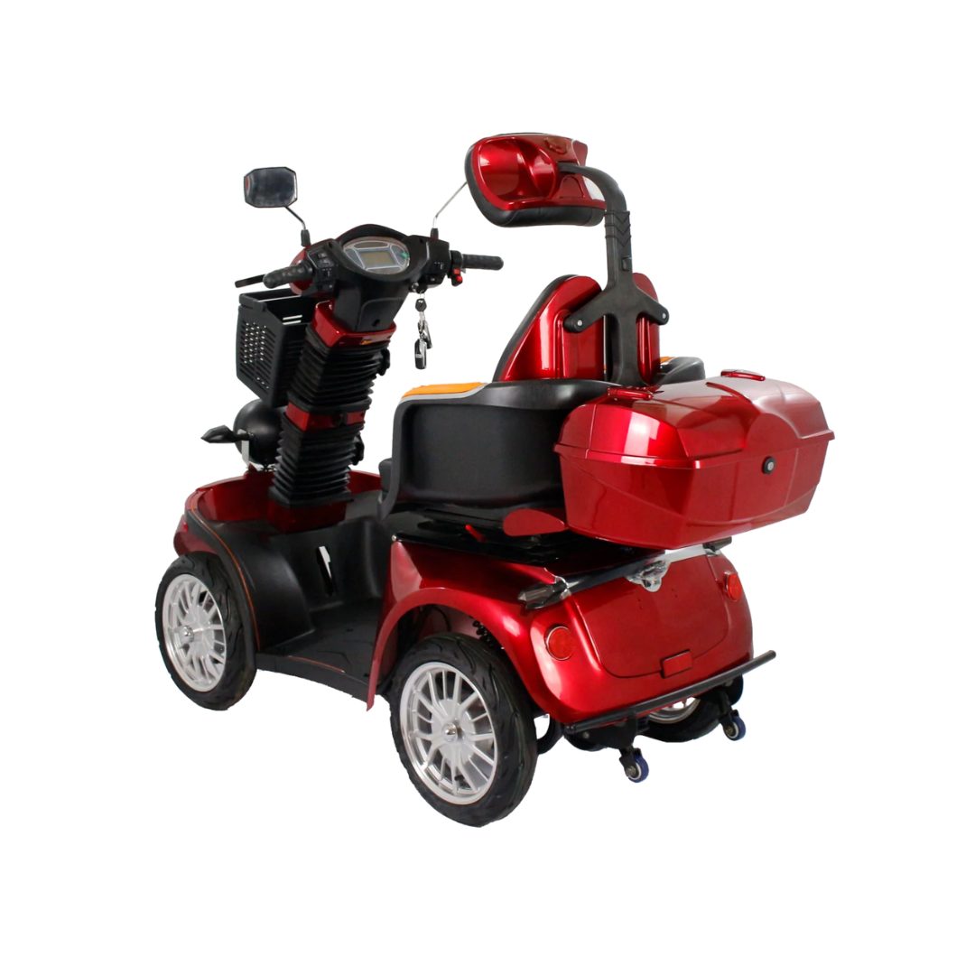 The GIO Tron Pro is a red mobility scooter with four-wheel stability, a rear storage box, backrest, mirrors, and digital display, shown on a white background from a rear-side angle.