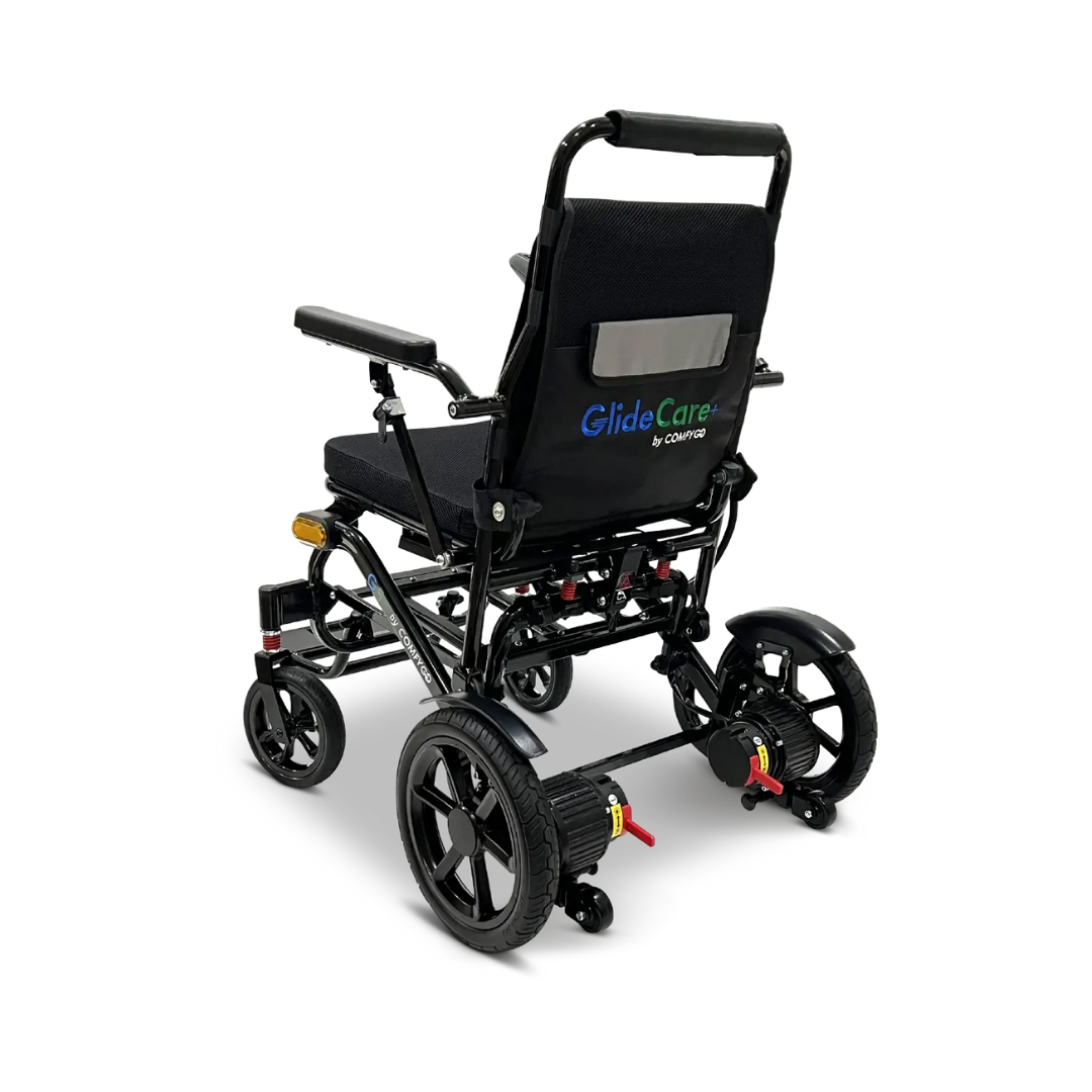 A rear view of the Glide Care G-5 PRO Lightweight Foldable Electric Wheelchair in black, featuring a padded seat, armrests, and large rear wheels with integrated motor units for effortless travel.