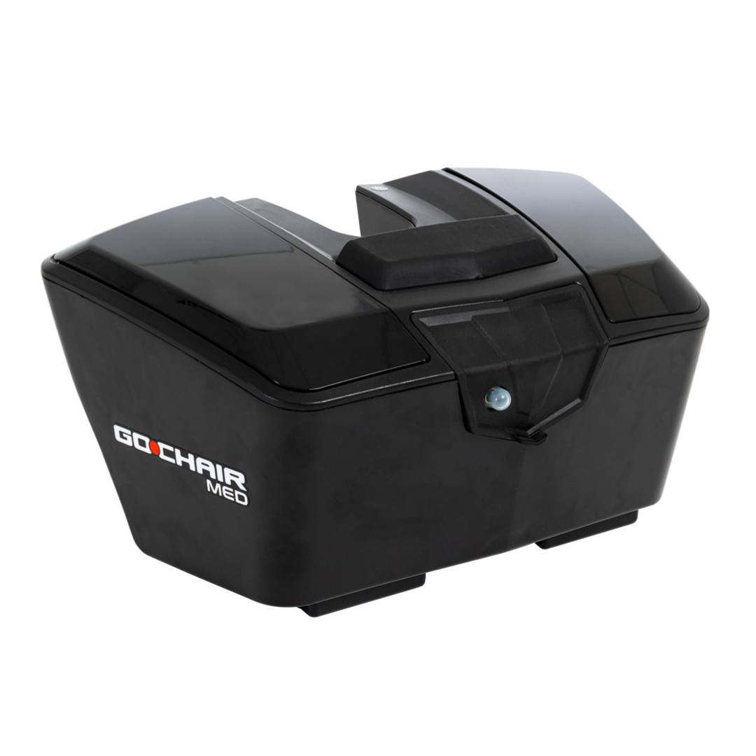 A black, hard-shell battery pack with a central handle and secure latch, designed for the Pride Mobility Go Chair® MED Portable Powerchair or travel wheelchair use.