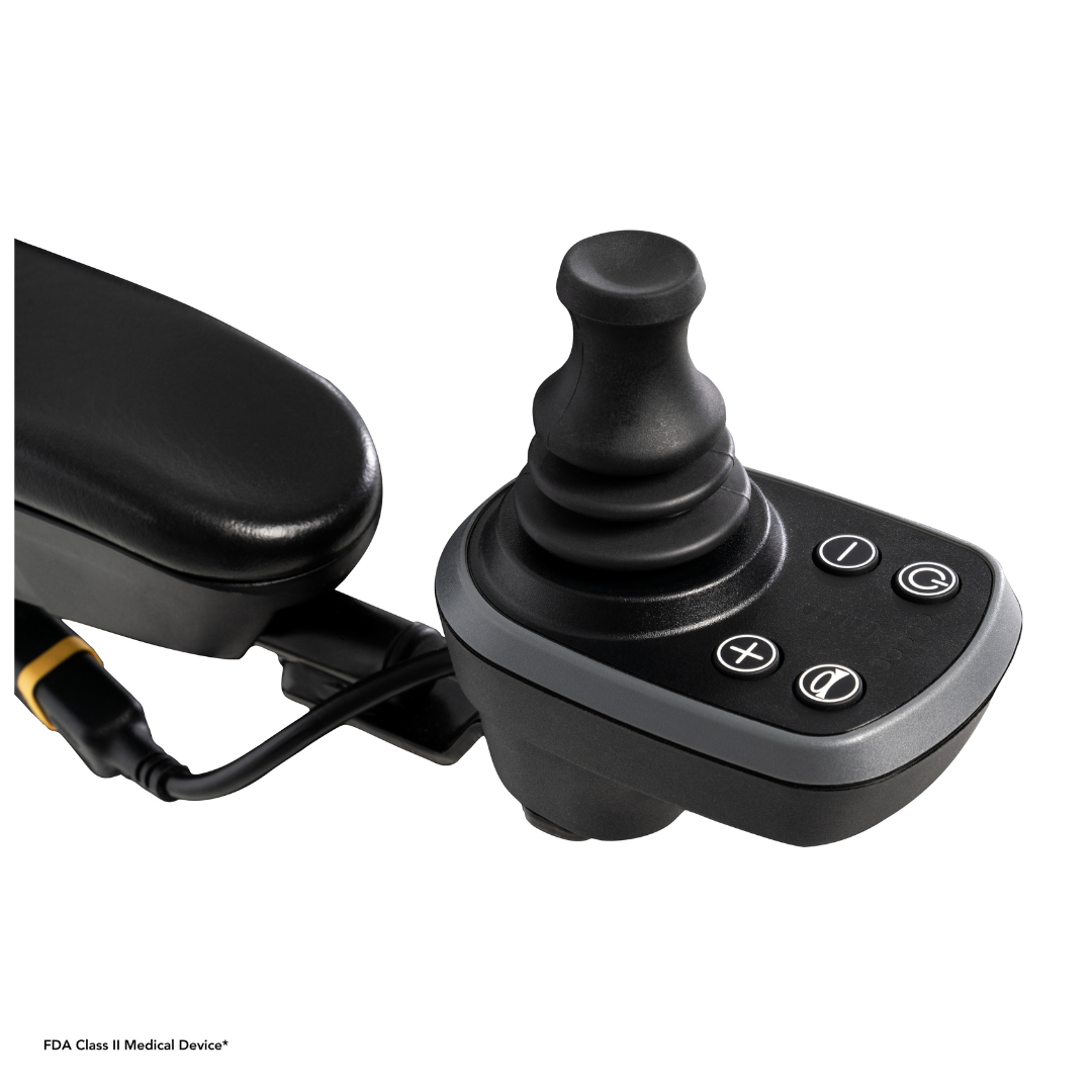 Close-up of a black electronic joystick controller with four buttons on the armrest of a Pride Mobility Go Chair® MED Portable Powerchair, shown against a plain white background.