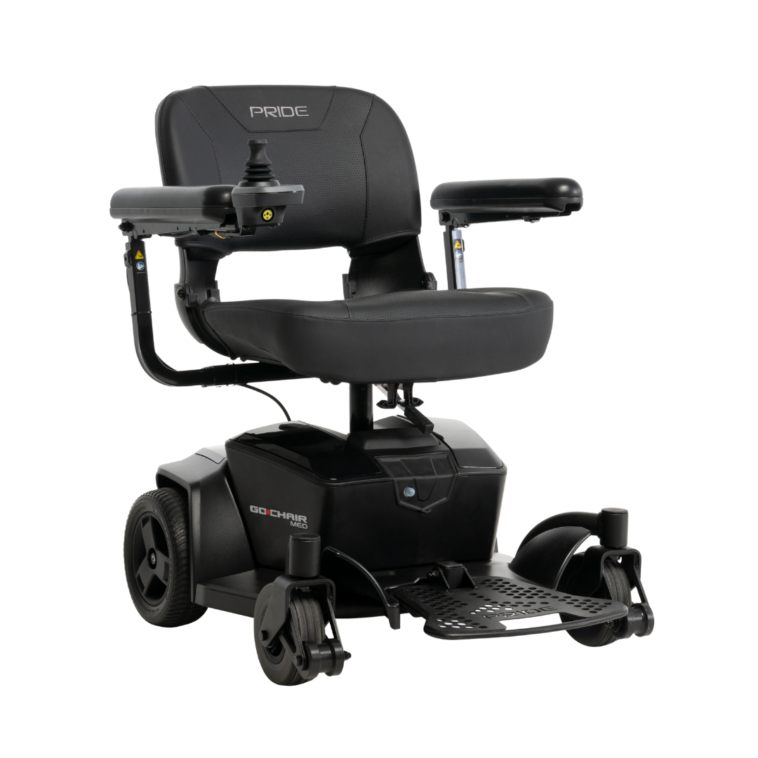 A black Pride Mobility Go Chair® MED portable powerchair with padded seat and armrests, left-side joystick control, and four wheels—perfect for lightweight travel. The Pride logo is visible on the seat back.