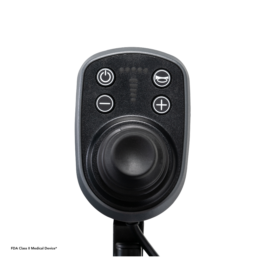 A close-up of the black joystick controller on the Pride Mobility Go Chair® MED Portable Powerchair, featuring five buttons—power, plus, minus, mode—and a central joystick for easy operation.