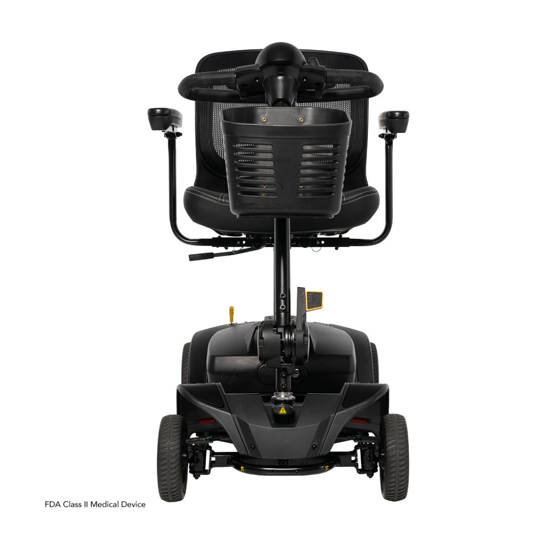 Rear view of a black Pride Mobility Go Go Elite Traveller® 2 Platinum Scooter, showing four wheels, mesh backrest, handlebars, armrests on the seat, and a sturdy base with visible wheel mechanisms.