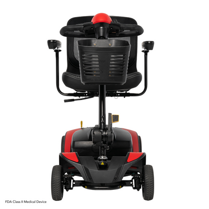 Rear view of a Pride Mobility Go Go Elite Traveller® 2 Platinum Scooter with four wheels, padded seat, armrests, and handlebars. The mobility scooter is displayed against a white background.