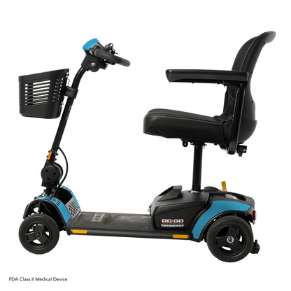 A side view of the Pride Mobility Go Go Elite Traveller® 2 Platinum Scooter, a blue and black three-wheel travel scooter with a front basket, padded seat with backrest and armrests, labeled GO-GO, designed for personal transportation.