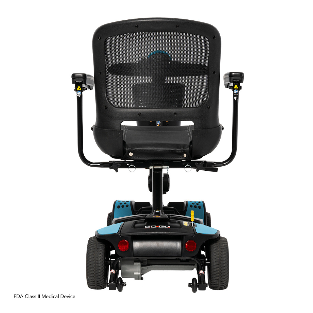 Rear view of the black Pride Mobility Go Go Elite Traveller® 2 Platinum Scooter with mesh backrest, armrests, and four wheels on a white background. "FDA Class II Medical Device" text appears in the bottom left corner.