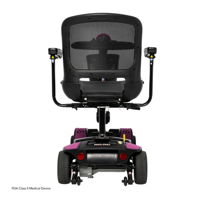 Rear view of the Pride Mobility Go Go Elite Traveller® 2 Platinum Scooter, featuring a black mesh backrest, armrests, four wheels, stylish purple accents, and an FDA Class II medical device label.