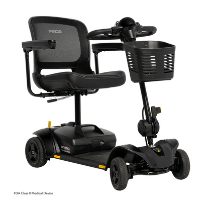 The Pride Mobility Go Go Elite Traveller® 2 Platinum Scooter is a black, three-wheel travel scooter with EZ Turn technology, mesh backrest, armrests, and front storage basket. This compact FDA Class II device is displayed on a white background.