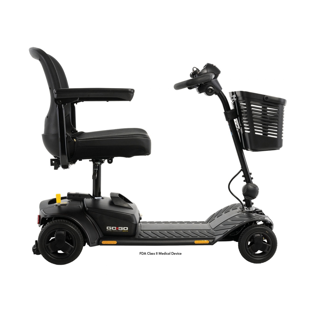 A black Pride Go Go® Elite Traveller Gen 3 Scooter with four wheels, a high-back seat, armrests, and a front-mounted storage basket.