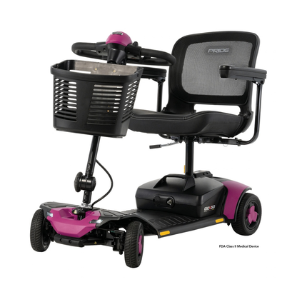Black and magenta Pride Go Go® Elite Traveller Gen 3 Scooter with four wheels, a front storage basket, and a mesh seat back.