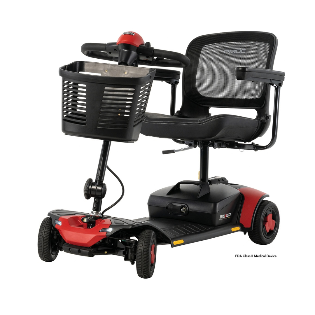 Pride Go Go® Elite Traveller Gen 3 Scooter with four wheels, a mesh seat, a black front basket, and red accents.