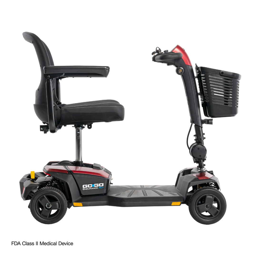 The Pride Mobility Go Go® Endurance AL+ Power Scooter, shown in profile on a white background with a modern grid layout, features a black and red frame, cushioned seat, armrests, front basket, and three wheels.