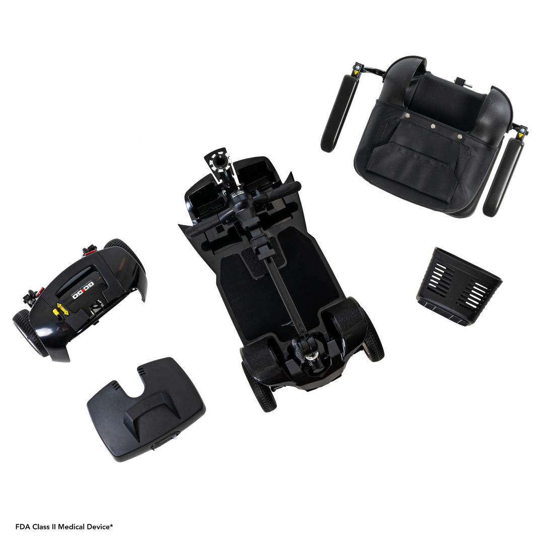 The Pride Mobility Go Go® Ultra X 4-Wheel Scooter, an FDA Class II Medical Device, disassembles into its base with wheels, handlebars, seat section, and a small square basket.