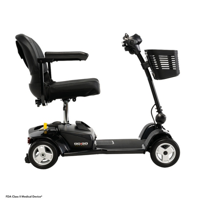 The Pride Mobility Go Go® Ultra X 4-Wheel Scooter in black features a cushioned seat, armrests, handlebars, and a front basket. Go-Go graces its rear. Set against a white background, this affordable mobility scooter offers comfort and style for every adventure.