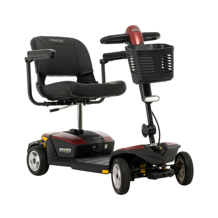 The Pride Mobility Go Go® Endurance Li 4-Wheel Scooter, in stylish red and black, includes a lithium battery for extended travel, padded seat with armrests, Comfort-Trac Suspension for smooth rides, handlebar steering, front basket, headlight and branded on the seat and steering column.