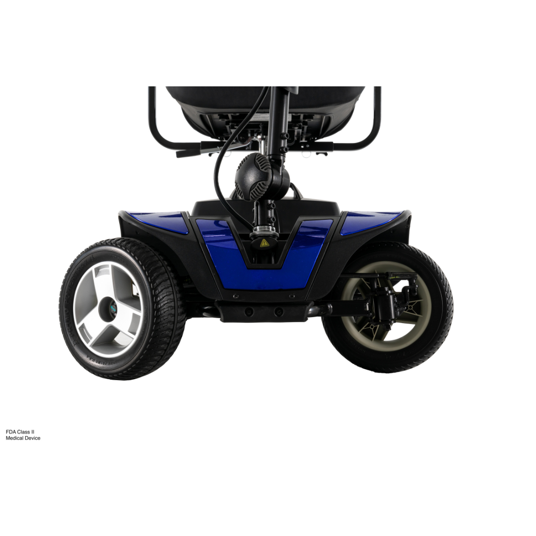 Close-up of the rear wheels and base of the blue Pride Go Go® Sport 4-Wheel Scooter, showcasing its large, sturdy tires and frame on a white background—perfect for responsive grid layouts or SEO keyword optimization.